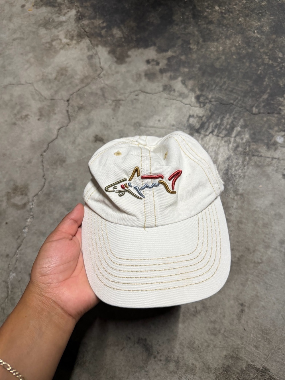 Greg Norman Collection White Cap with Multicolor Embroidered Shark Patch